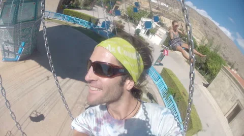 Man Rides Merry Go Round - POV Stock Footage 55887749