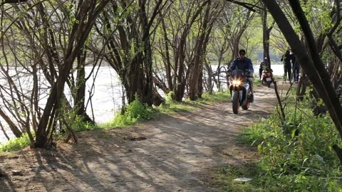 A man rides a motorcycle Stock Footage 132444074