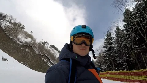 Man rides on a snowboard Video stock 86325349