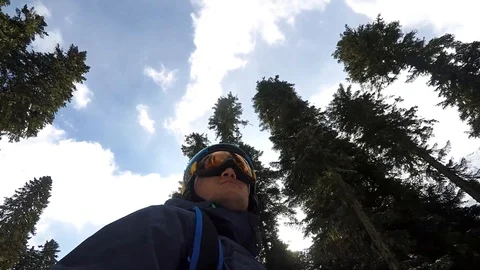 Man rides on a snowboard Stock Footage 86325679