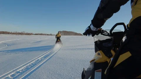 Man rides a snowmobile 7 Stock Footage 99925973