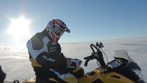 Man rides a snowmobile 9 Stock Footage 99925862
