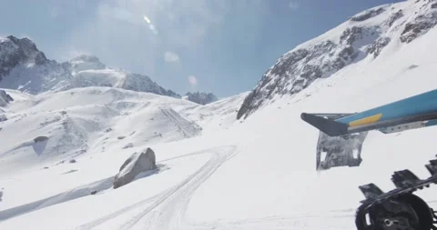 Man rides a snowmobile. Transition to a circular panorama of snowy mountains Sun Stock Footage 145256102