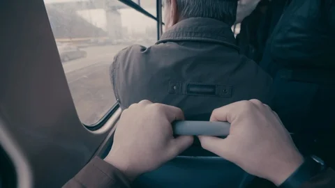 Man rides a Soviet tram and looks out the window. point of view Stock Footage 129558920