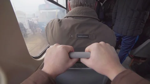Man rides a Soviet tram and looks out the window. point of view Stock Footage 129576000