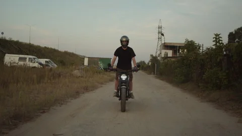 A man rides standing on a motorcycle off-road Stock Footage 253447050