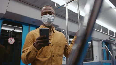 A man rides the subway to work. Spending time on the phone, solving work issues Stock Footage 239324029