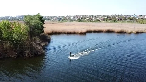 A man rides wakeboarding Stock Footage 107537955