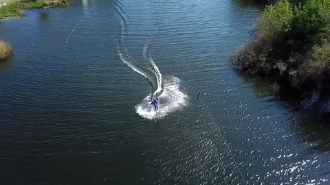 A man rides wakeboarding Stock Footage 107538183