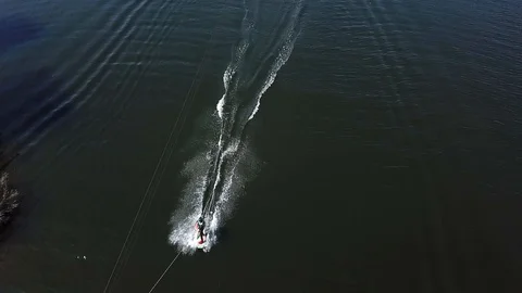 A man rides wakeboarding Stock Footage 107538187
