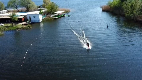 A man rides wakeboarding Stock Footage 107538188