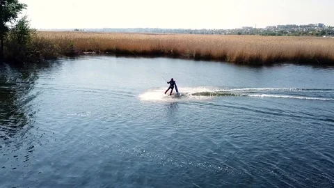 A man rides wakeboarding Video stock 107538196