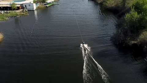 A man rides wakeboarding Stock Footage 107538290