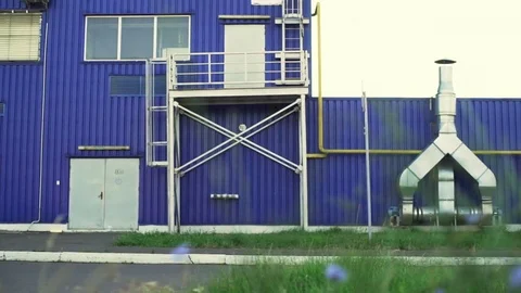 Man riding bicycle on the building background sundown slow motion rapid Stock Footage 78041521