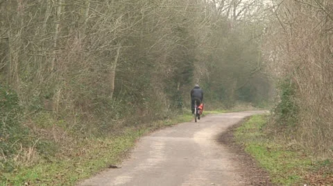 Man riding a bicycle Stock Footage 22939075