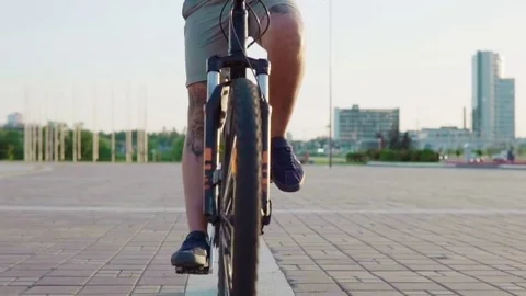 Man riding a bicycle Stock Footage 79070900