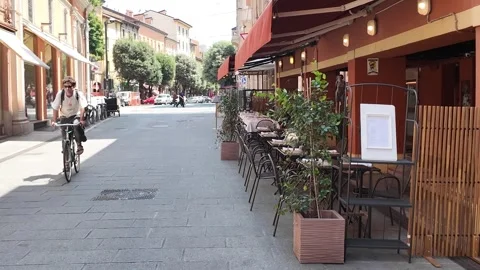 Man riding bicycle though the city center, Bologna, Italy. Stock Footage 339062853