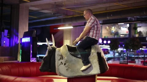 A man riding a bull Stock Footage 45800939