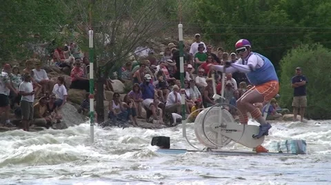 Man Riding Elliptical down River 動画素材 54602549
