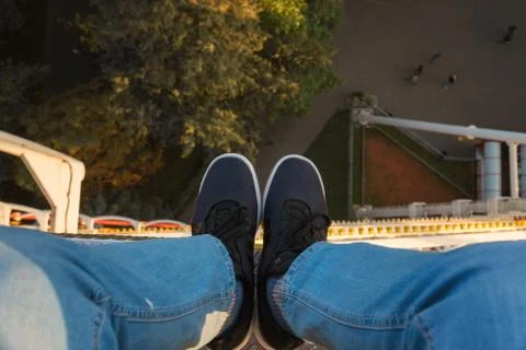 A man is riding a Ferris wheel Stock Photos