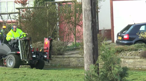 Man riding grasscutter Stock-Footage 36689162