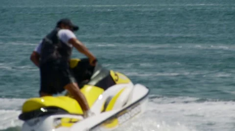 Man riding jet ski Stock Footage 54593020