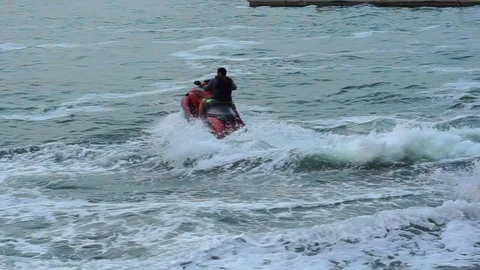 MAN RIDING A JET SKI Video stock 89707316