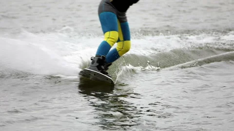 Man is riding on the lake on a surfboard 스톡 동영상 93663312