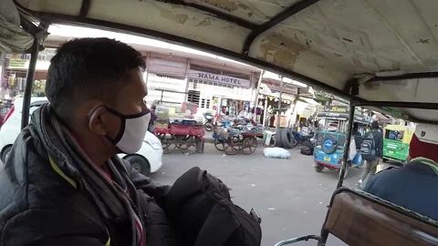Man riding local auto-rickshaw, TukTuk taxi while solo traveling in india Video stock 145679546