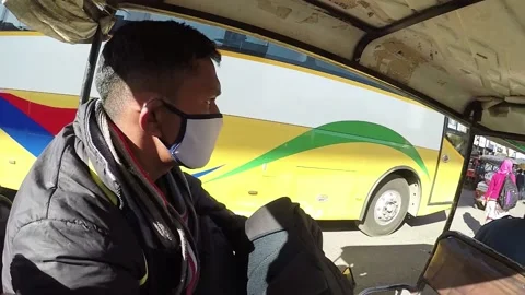 Man riding local auto-rickshaw, TukTuk taxi while solo traveling in india Stock Footage 145679631