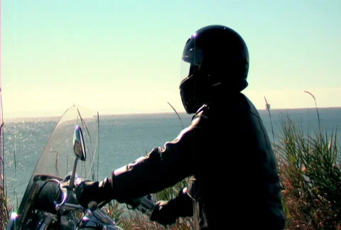 Man riding motorcycle ANAMORPHIC Stock Footage 35726059