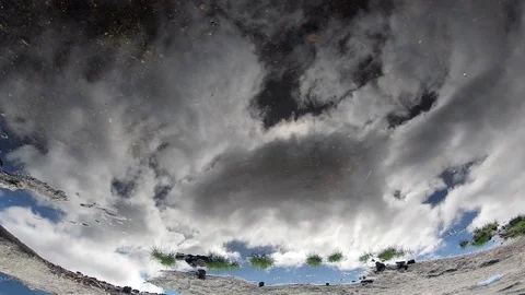 Man riding mountain bike in nice reflecting in the water Stock Footage 116994792