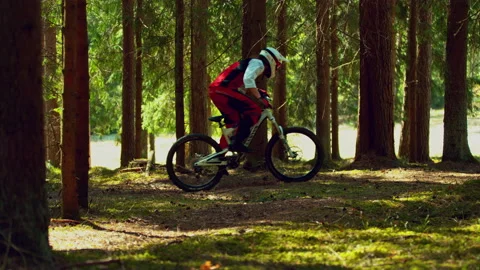 A man riding mtb in a forest in super slow motion Stock-Footage 146858136