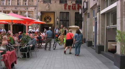Man riding rickshaw in central Cologne Stock Footage 51347657