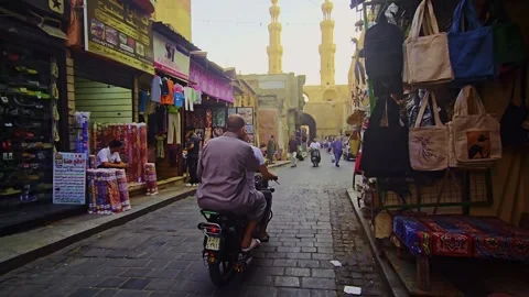 A man riding a scoot on a scoote Video stock 292196673