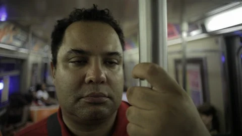 Man riding subway dozing off Stock Footage 128983447