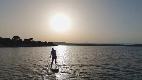 Man riding sup on sunset 스톡 동영상 278188513