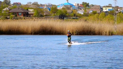 A man riding a wakeboard Stock Footage 107537407