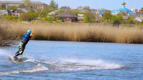 A man riding a wakeboard Stock Footage 107537408