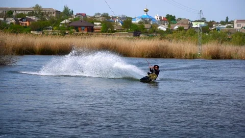 A man riding a wakeboard Stock Footage 107537479
