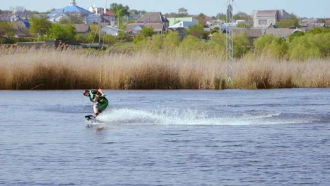A man riding a wakeboard Stock Footage 107537795