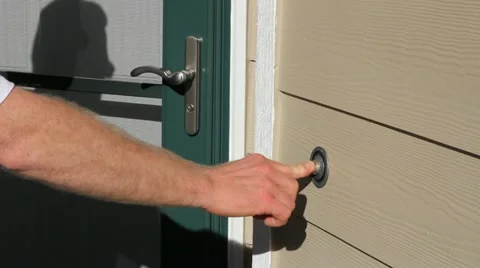 Man Ringing Door Bell Stock Footage 12331487