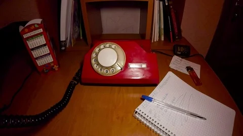 A man is ringing the old Soviet phone Stock Footage 74171284