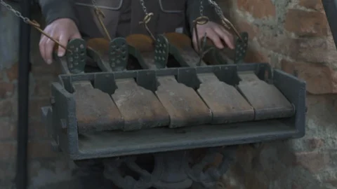 Man rings bells with a keyboard 스톡 동영상 88480312