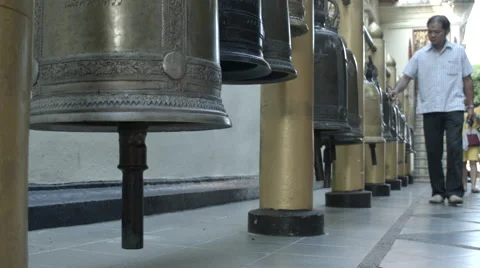 Man rings Buddhist prayer bells, Wat Phra That Doi Suthep, Chiang Mai, Thailand Stock-Footage 48204199