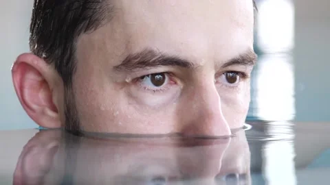Man rises from the water Stock Footage 91977785