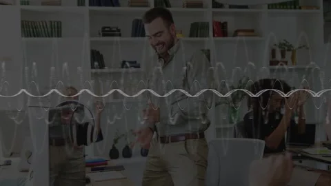 Man rising from desk, celebrating while team clapping in office with wavy Stock Footage 333078170