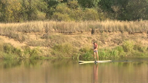 A man on the river, Paddle Board Stock Footage 54206464