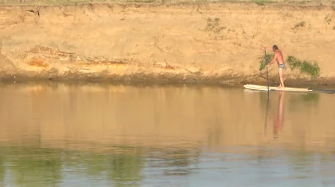 A man on the river, Paddle Board Stock Footage 55204203