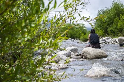Man in a river Stock Photos